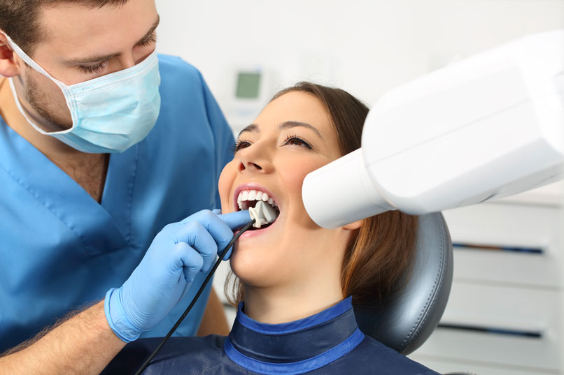 Patient Undergoing Emergency Dental Treatment in Quincy and Norwell, MA